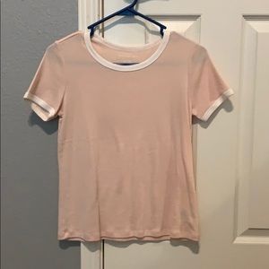 light pink shirt with white collar